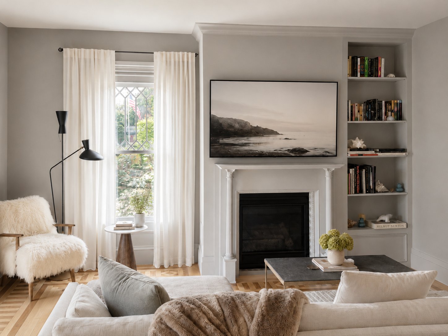 Living room with fireplace and built-in shelving