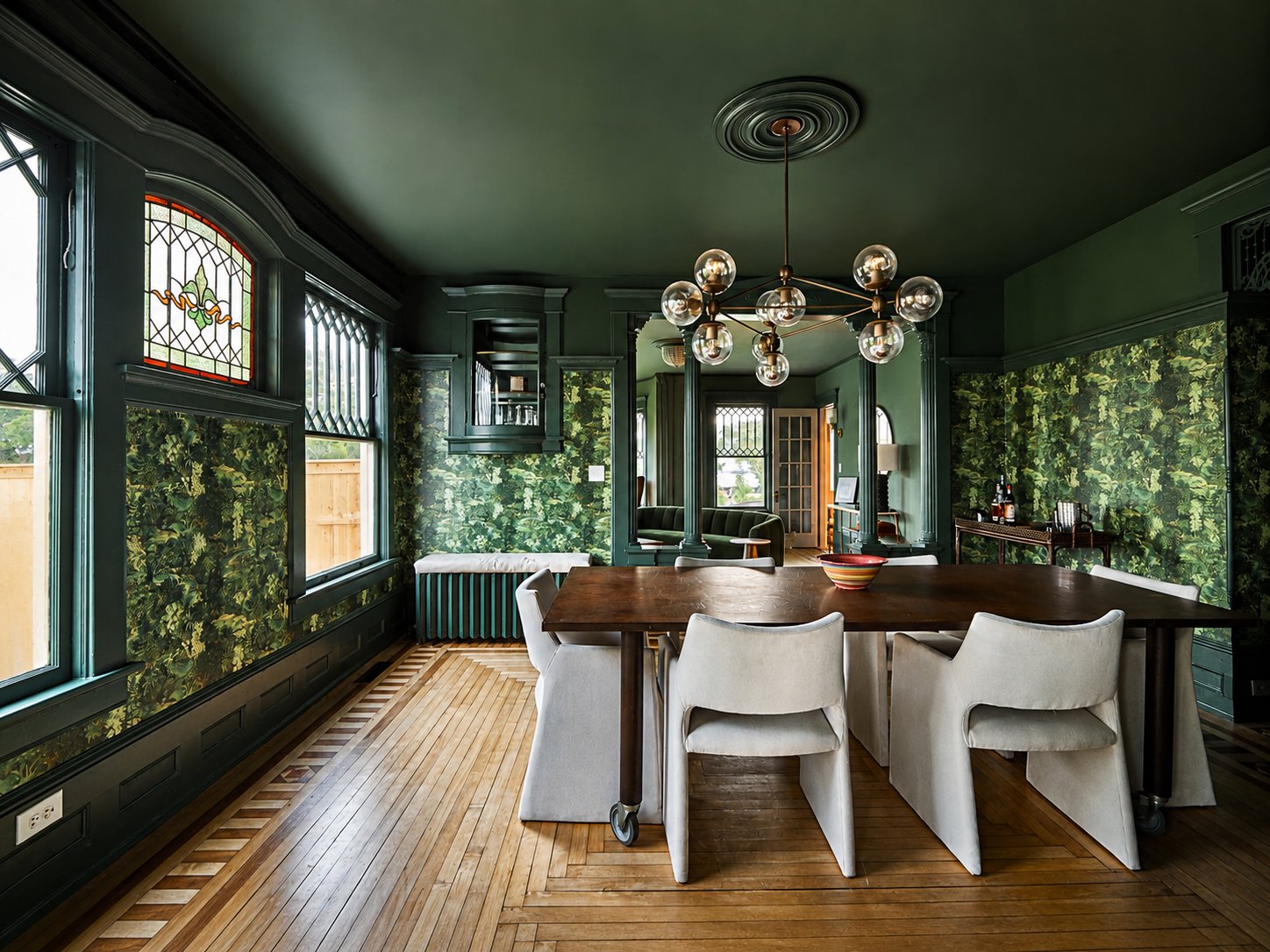 The dining room with original stained glass and leaded windows